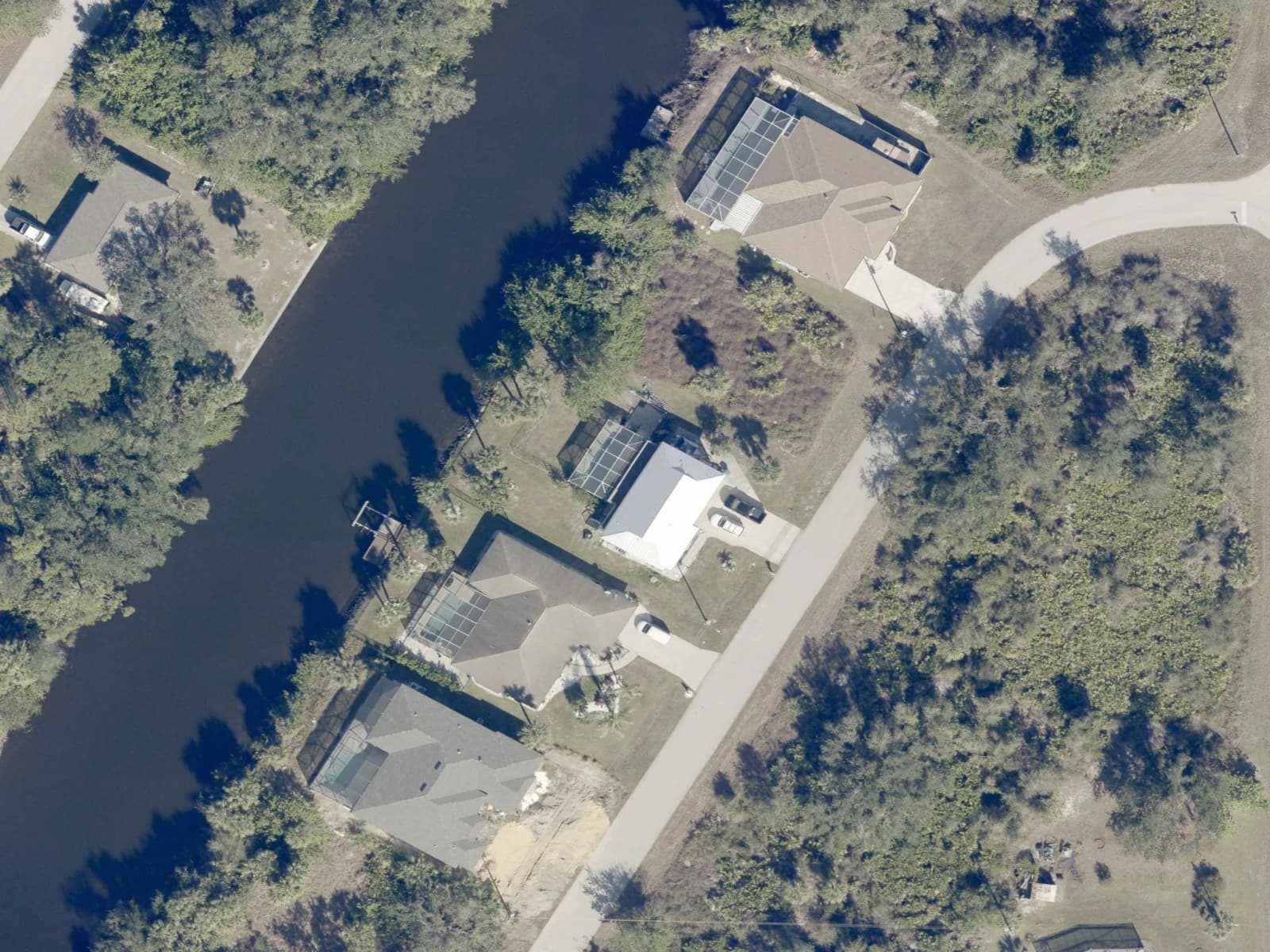 January 2025 Charlotte County aerial showing the Knox Terrace canal-front parcel and surrounding lots